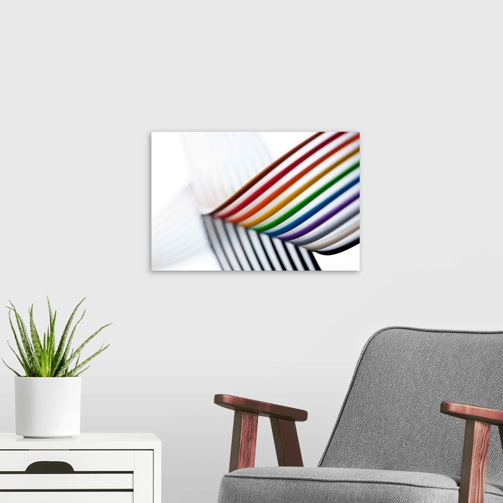 A modern room featuring Rainbow ribbon cable. A ribbon cable (also known as multi-wire planar cable) is an insulated cabl...