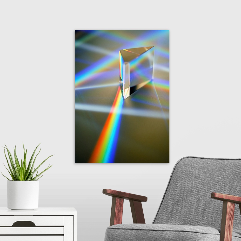 A modern room featuring Refraction. White light being refracted as it passes through a triangular prism to produce a spec...