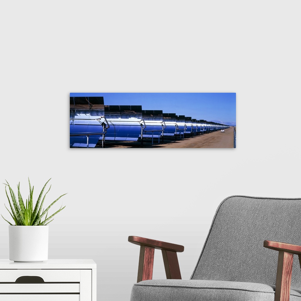 A modern room featuring Solar power plant. There are nine solar power plants located in California's Mojave desert, USA, ...