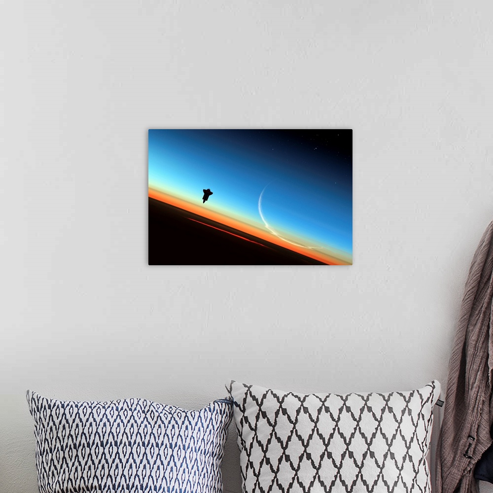 A bohemian room featuring Space shuttle above Earth's atmosphere, composite image.