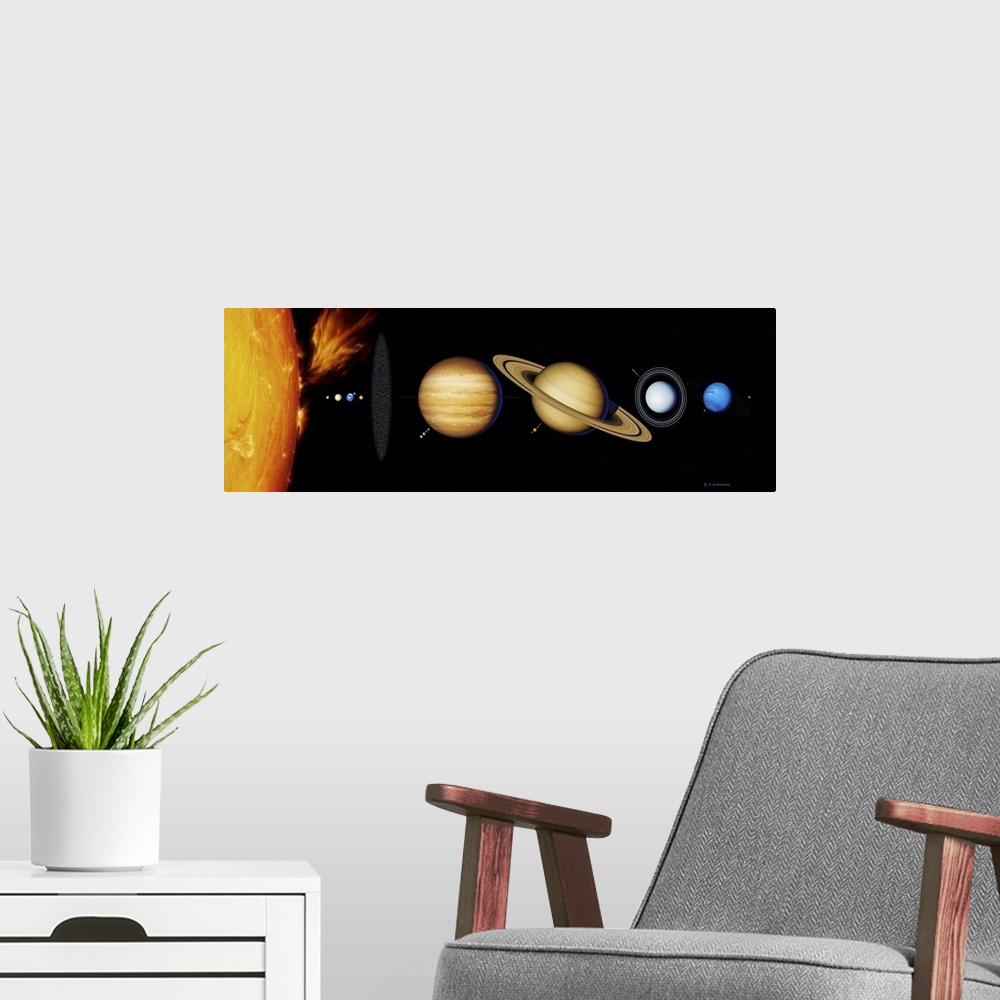 A modern room featuring Sun and its planets. Artwork of the nine planets of the solar system arrayed from left to right i...