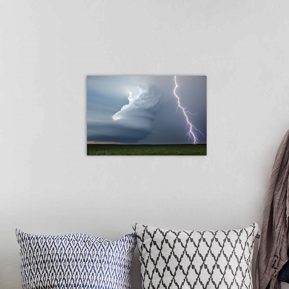 A bohemian room featuring Supercell thunderstorm and lightning strike over rural Nebraska, USA. A supercell thunderstorm is...