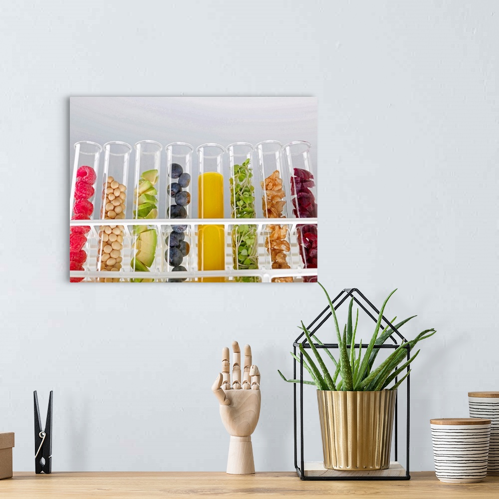 A bohemian room featuring Superfoods. Test tubes containing a variety of superfoods. From left to right are: raspberries, s...
