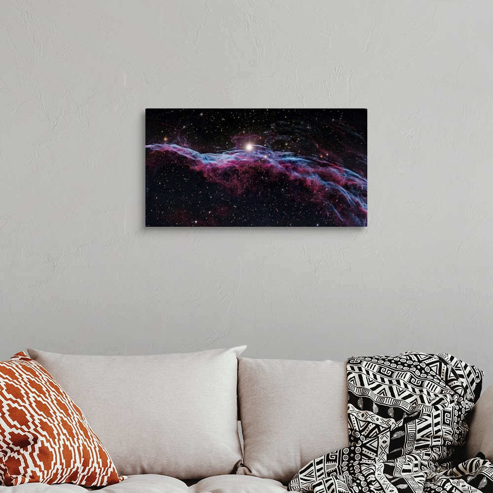 A bohemian room featuring Veil Nebula (IC 1340), optical image. The Veil Nebula is a cloud of heated and ionized gas and du...