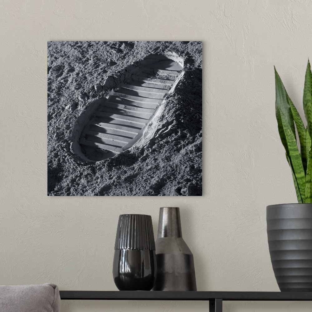 A modern room featuring Walking on the Moon. Computer illustration of an astronaut's bootprint on the surface of the Moon.