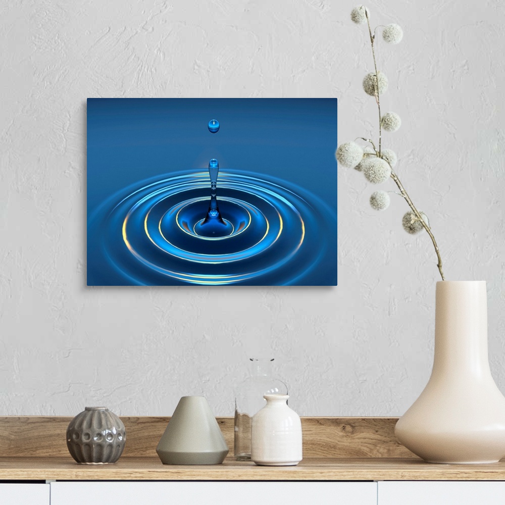 A farmhouse room featuring Computer artwork of secondary drop formation following the impact of a water drop falling into a ...
