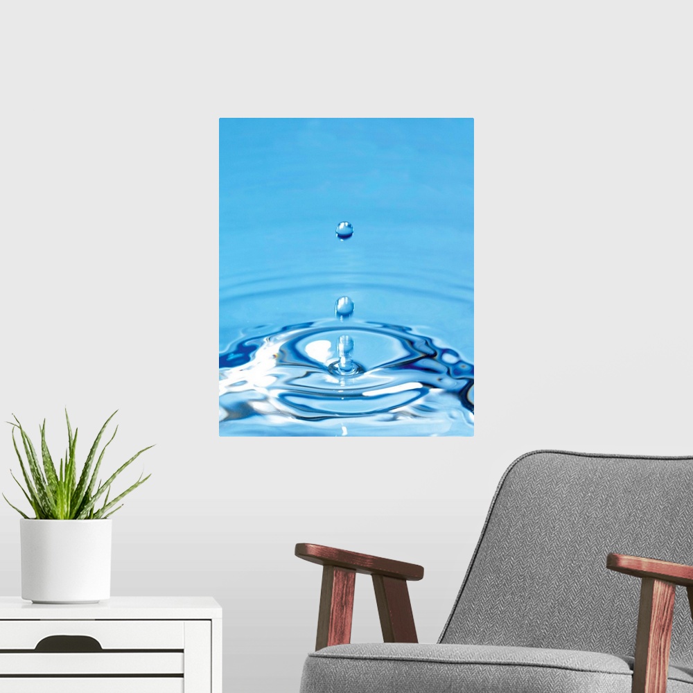 A modern room featuring Water drop impact. High-speed photograph of secondary drop formation following the impact of a wa...