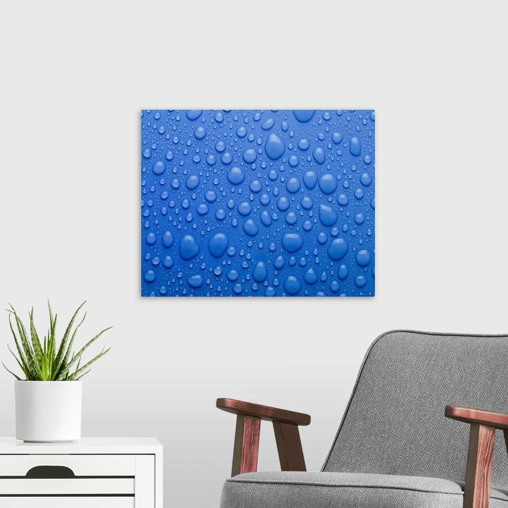 A modern room featuring Water droplets as condensation on a flat surface.