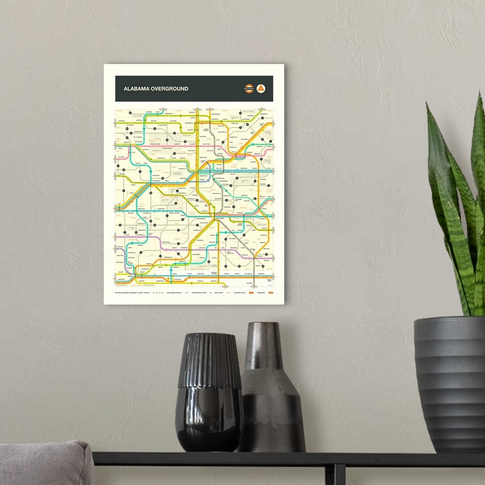 A modern room featuring Illustrated map of the Alabama state highways with labels and a key at the bottom.