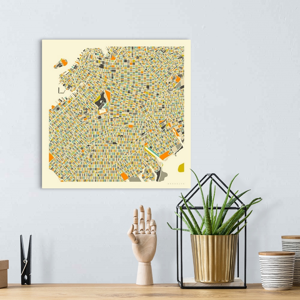 A bohemian room featuring Colorfully illustrated aerial street map of Brooklyn, New York on a square background.