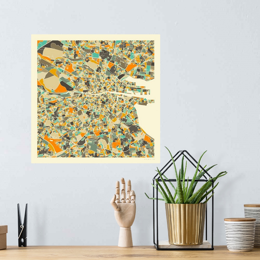 A bohemian room featuring Colorfully illustrated aerial street map of Dublin, Ireland on a square background.