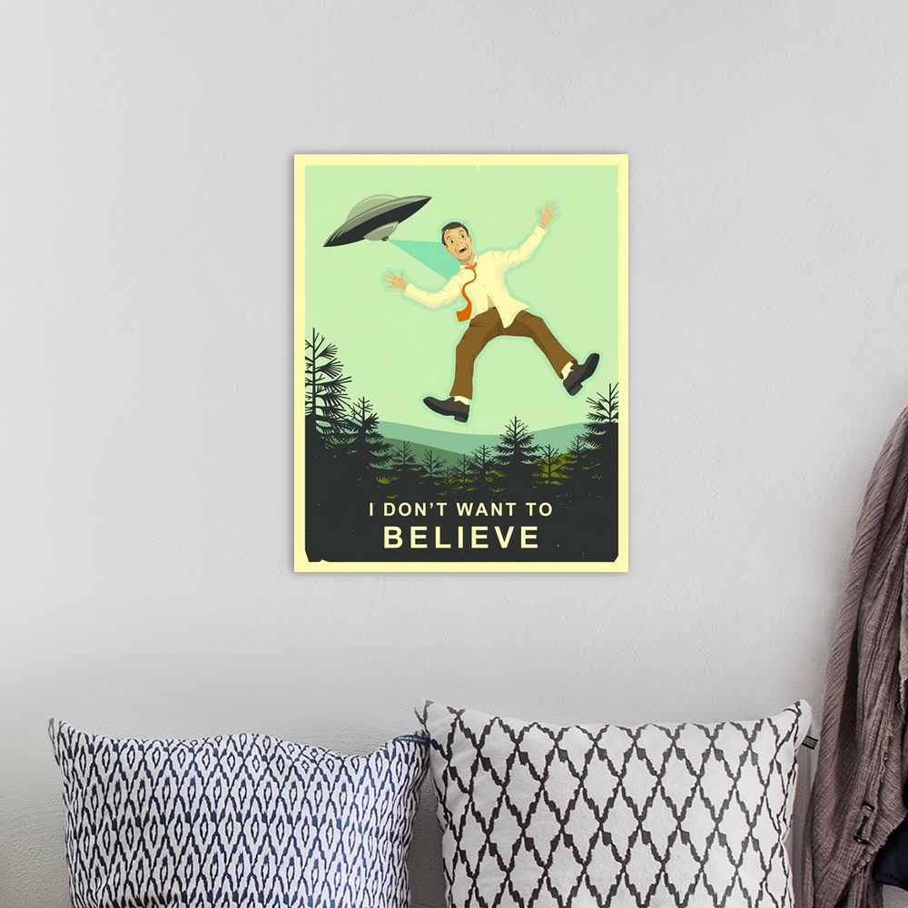 A bohemian room featuring Illustration of a man being transported to an alien space ship in the sky with the text "I Don't ...
