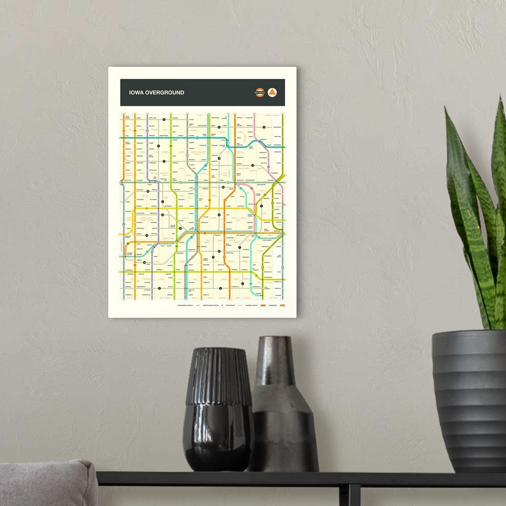 A modern room featuring Illustrated map of the Iowa state highways with labels and a key at the bottom.
