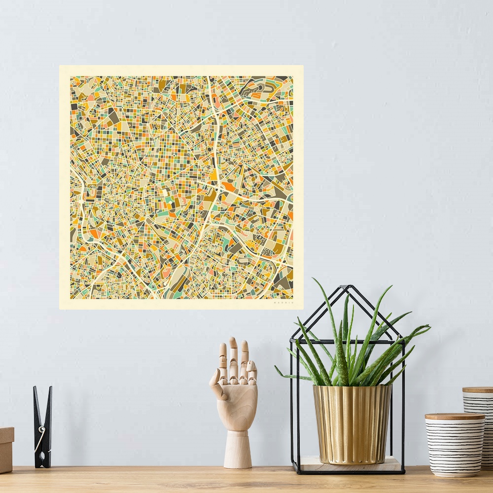 A bohemian room featuring Colorfully illustrated aerial street map of Madrid, Spain on a square background.