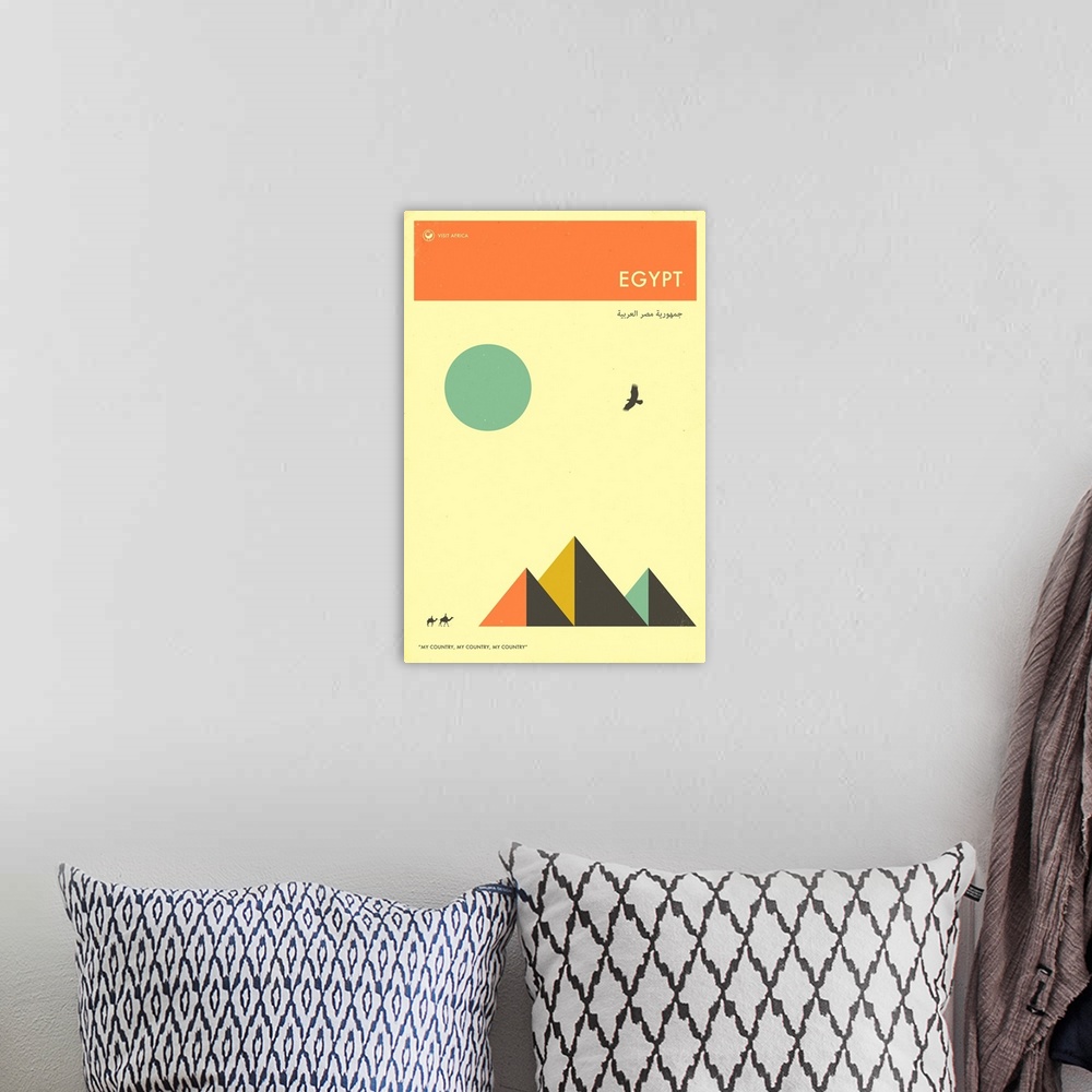 A bohemian room featuring Minimalist retro style Visit Africa travel poster for Egypt.