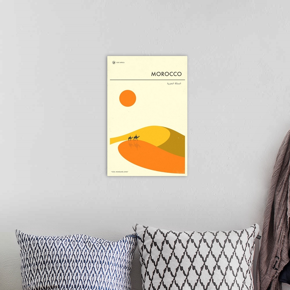 A bohemian room featuring Minimalist retro style Visit Africa travel poster for Morocco.