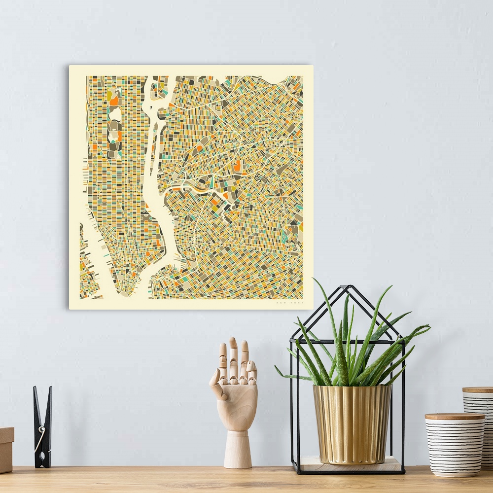 A bohemian room featuring Colorfully illustrated aerial street map of New York City on a square background.