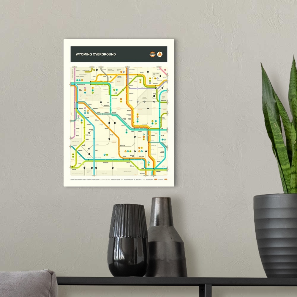 A modern room featuring Illustrated map of the Wyoming state highways with labels and a key at the bottom.