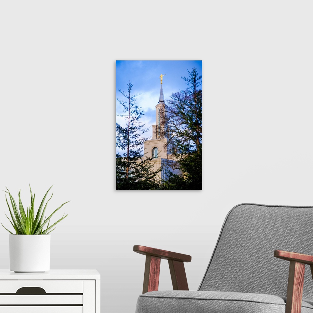 A modern room featuring The Sacramento California Temple overlooks Lake Natoma from the hill where it sits. The Sierra Ne...