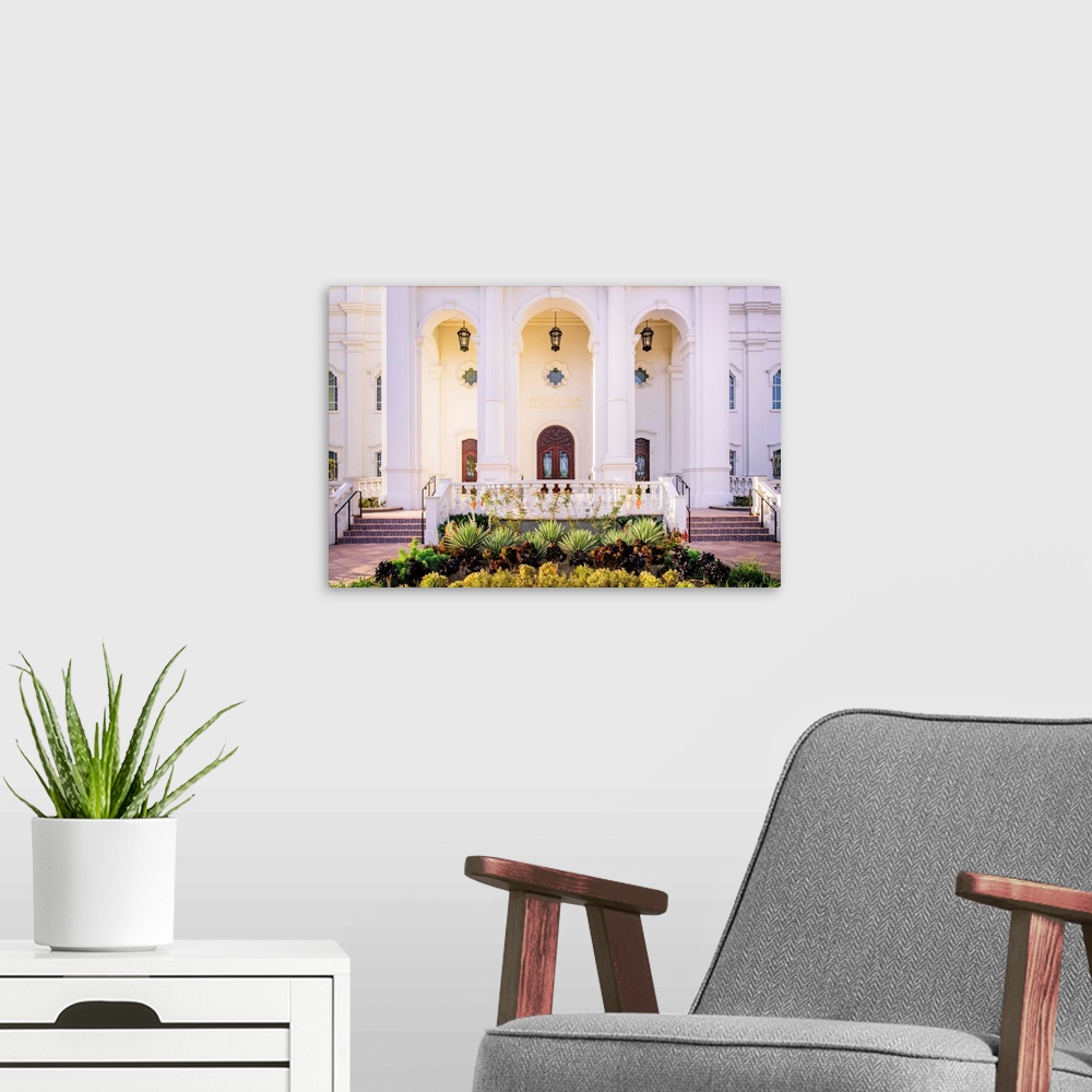 A modern room featuring The Tijuana Mexico Temple is located in Baja California. The entrance of the temple is adorned wi...