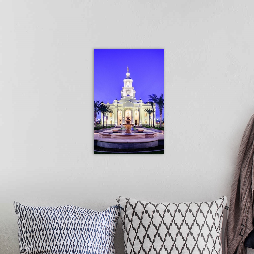 A bohemian room featuring The Tijuana Mexico Temple is located in Baja California. The entrance of the temple is adorned wi...