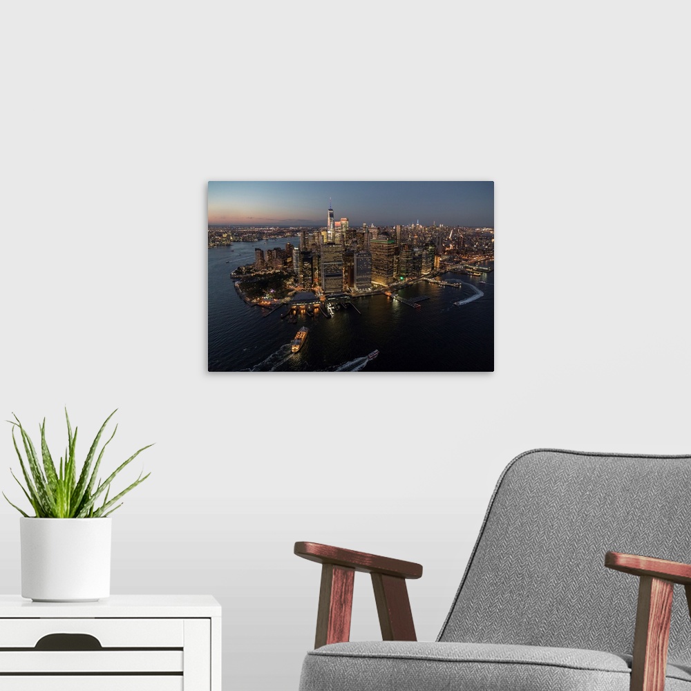 A modern room featuring Aerial view of New York City at sunset