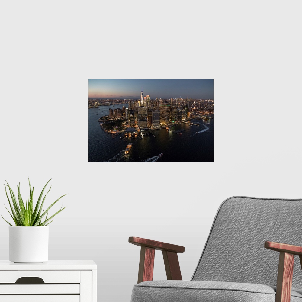 A modern room featuring Aerial view of New York City at sunset
