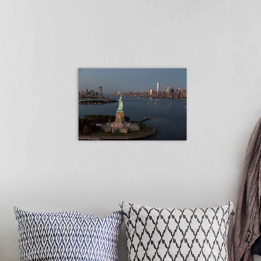 A bohemian room featuring Aerial view of the Statue of Liberty and New York City