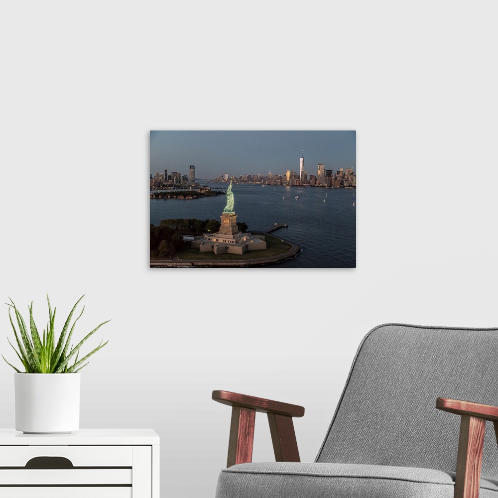 A modern room featuring Aerial view of the Statue of Liberty and New York City