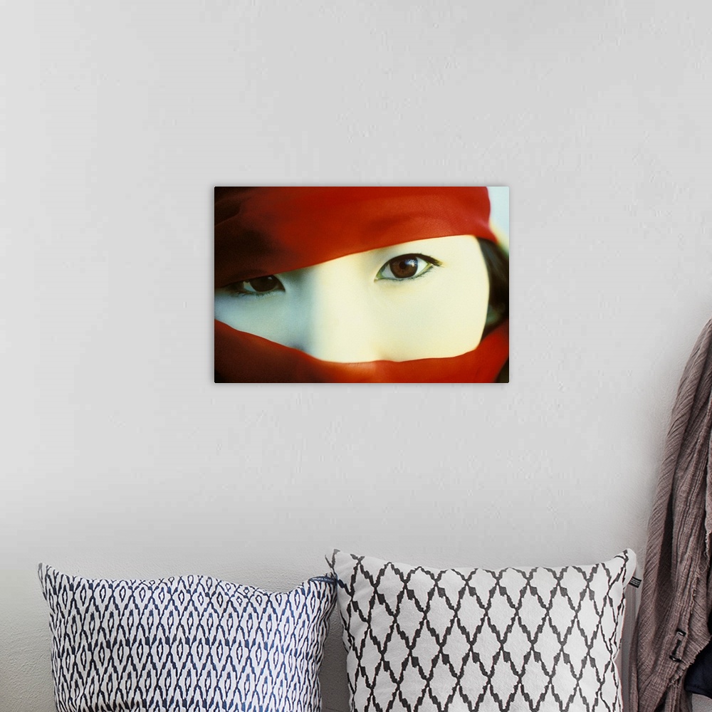 A bohemian room featuring Asian Woman with Red Scarf