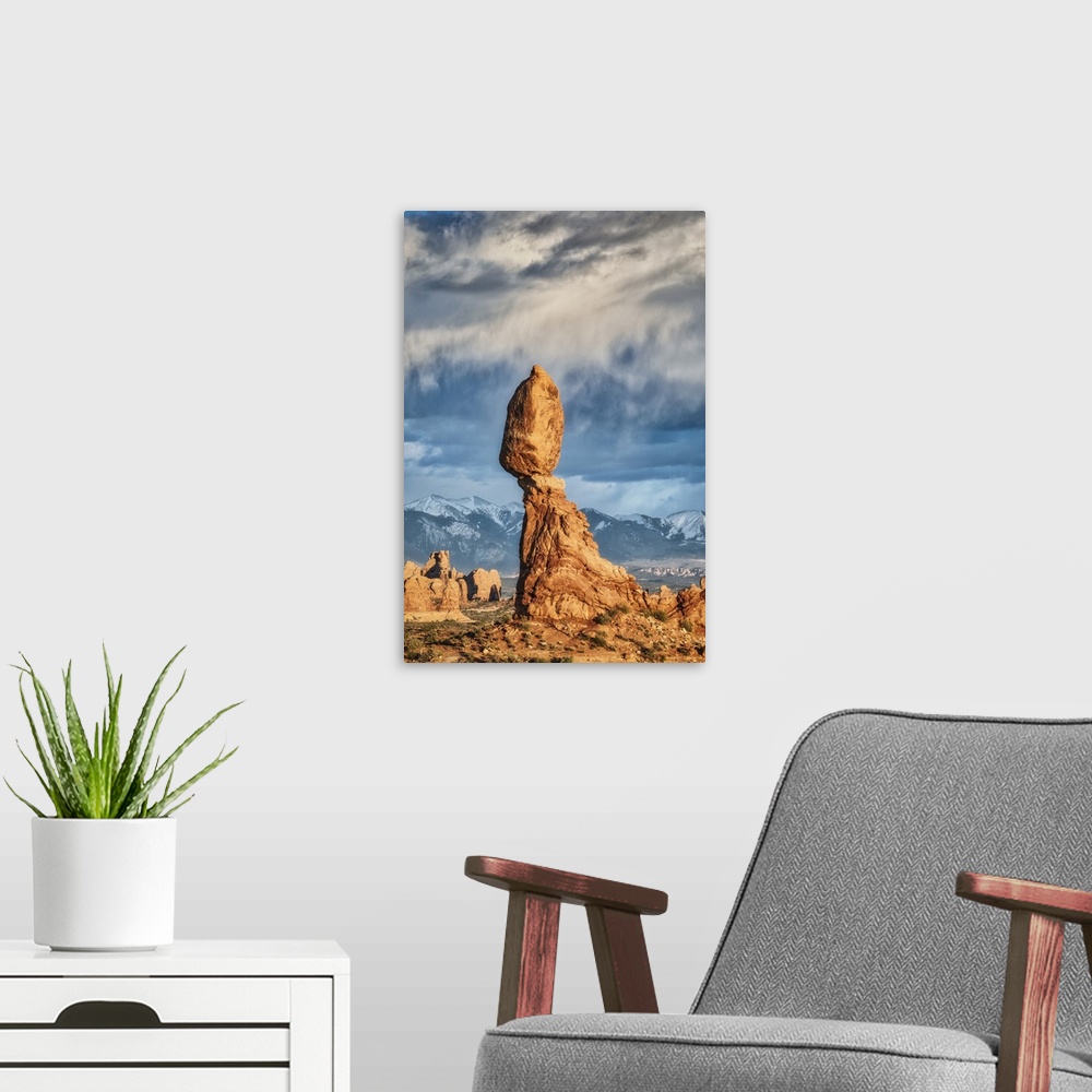 A modern room featuring Balanced Rock in Arches National Park at sunset