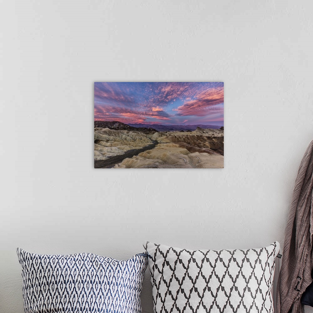 A bohemian room featuring Beautiful sunrise at Zabriski Point in Death Valley National Park.