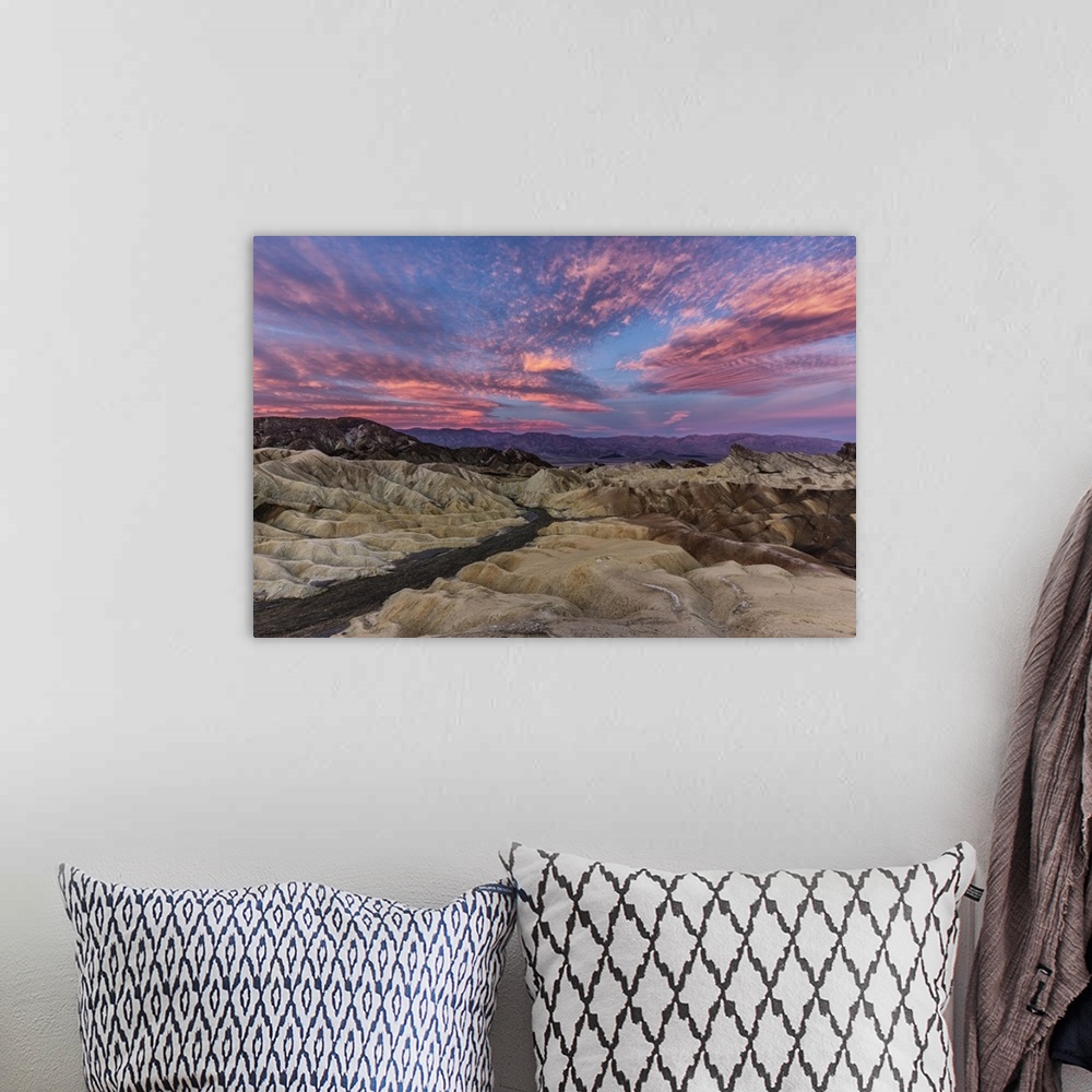 A bohemian room featuring Beautiful sunrise at Zabriski Point in Death Valley National Park.