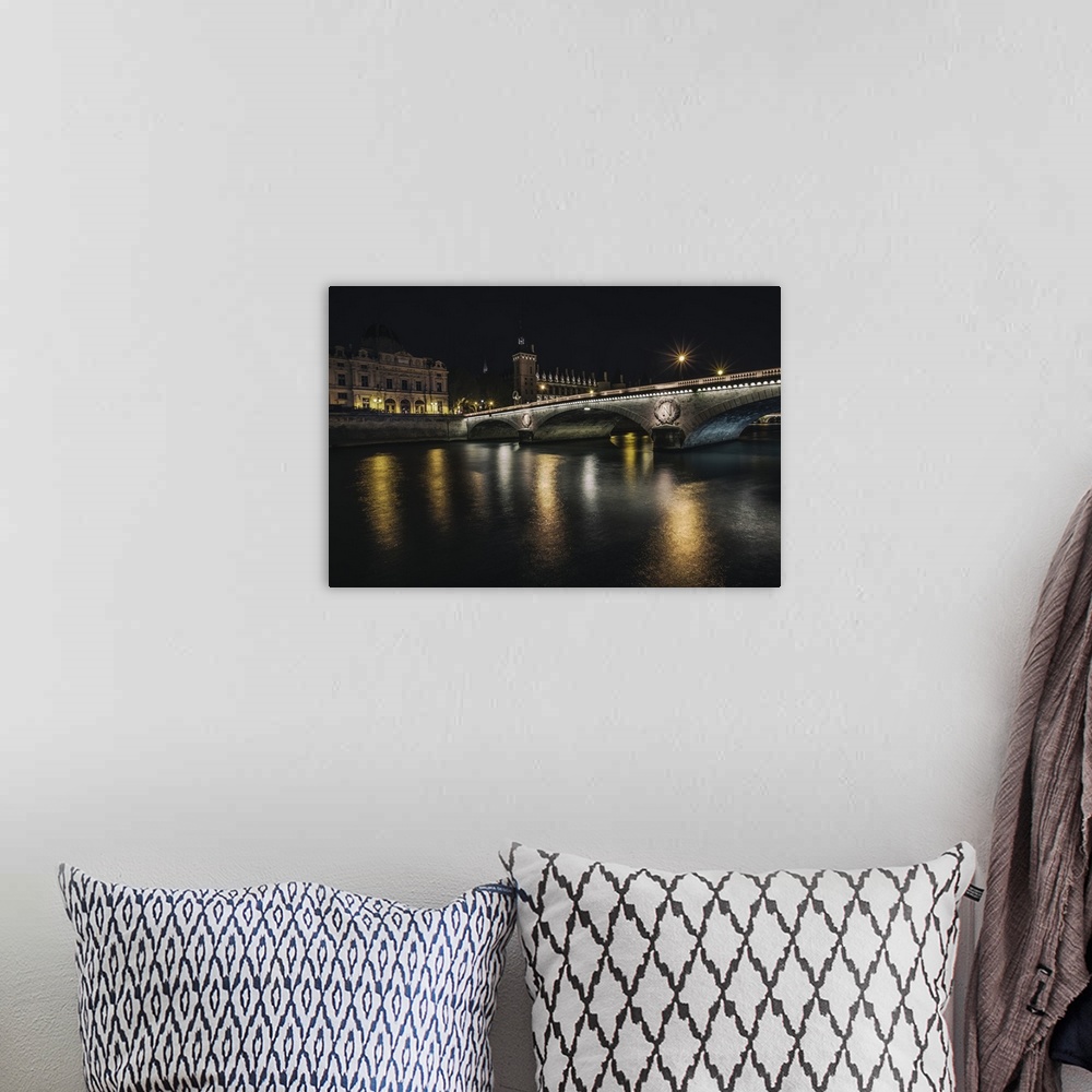 A bohemian room featuring Bridge across the Seine at night in Paris, France