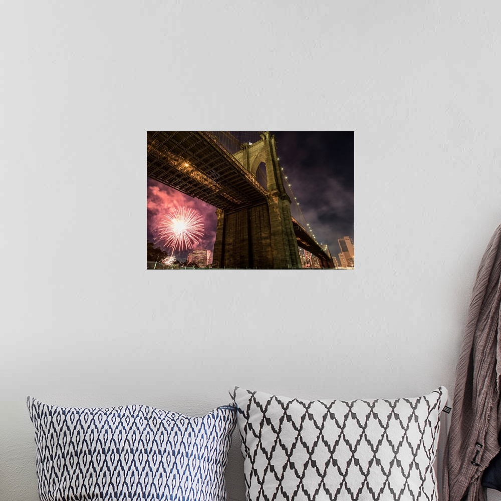 A bohemian room featuring Brooklyn Bridge and fireworks over Manhattan in NYC