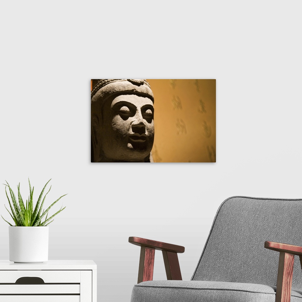 A modern room featuring Buddha Head