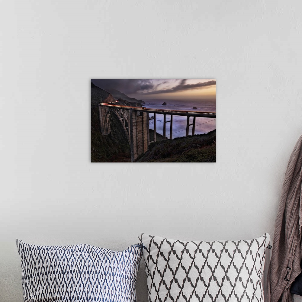 A bohemian room featuring Car Trails at sunset on the Bixby Bridge, Big Sur, California