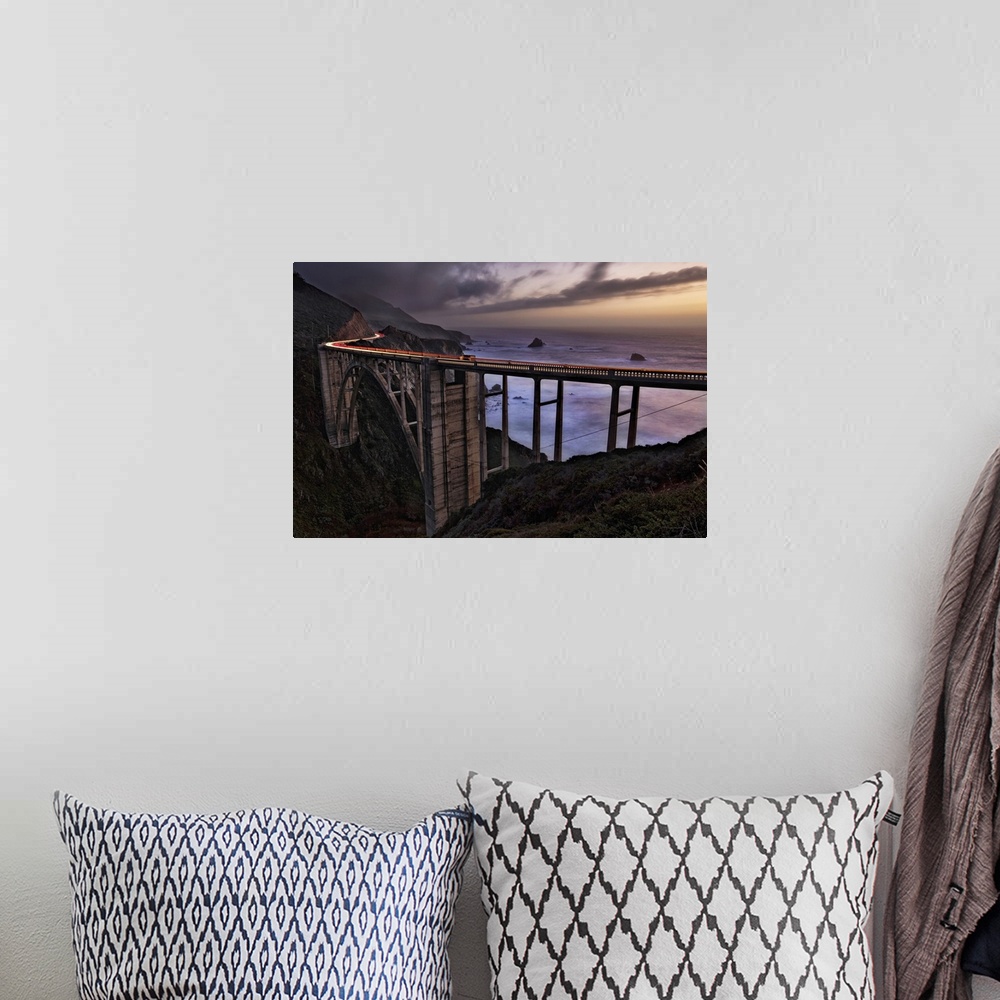 A bohemian room featuring Car Trails at sunset on the Bixby Bridge, Big Sur, California