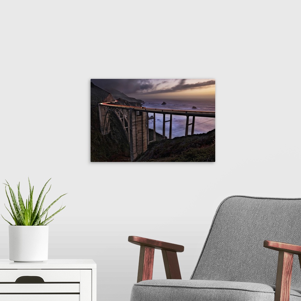 A modern room featuring Car Trails at sunset on the Bixby Bridge, Big Sur, California