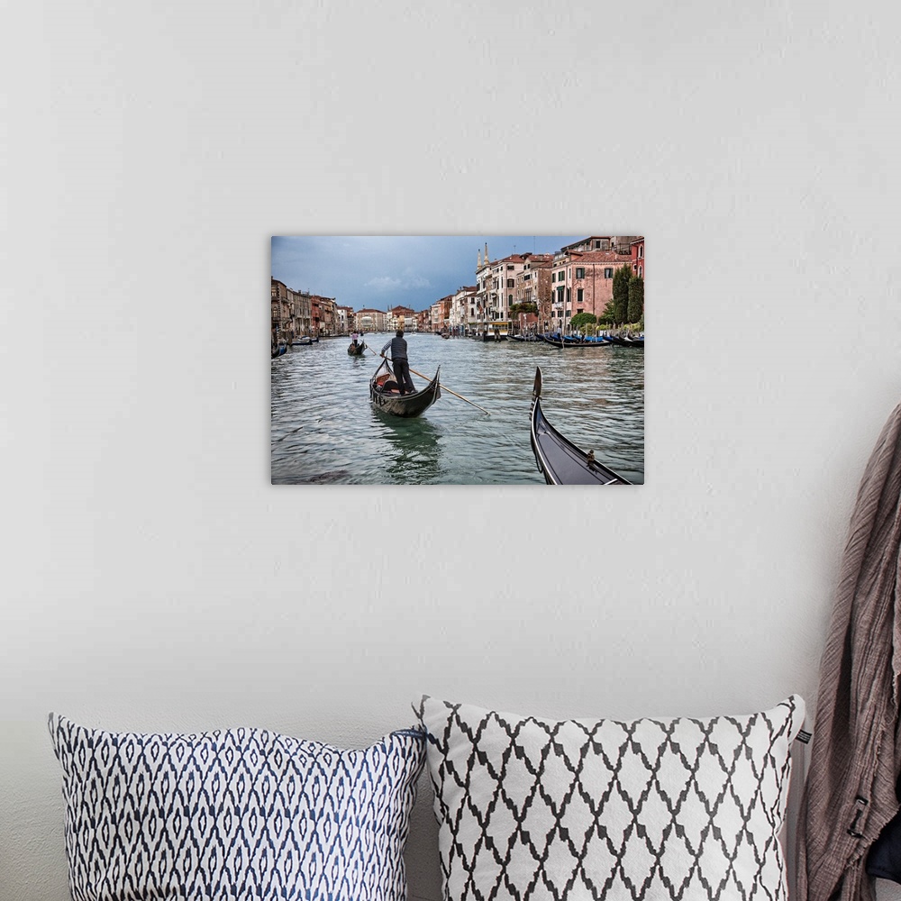A bohemian room featuring Gondolas at sunset in Venice, Italy.