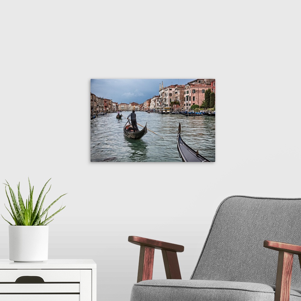 A modern room featuring Gondolas at sunset in Venice, Italy.