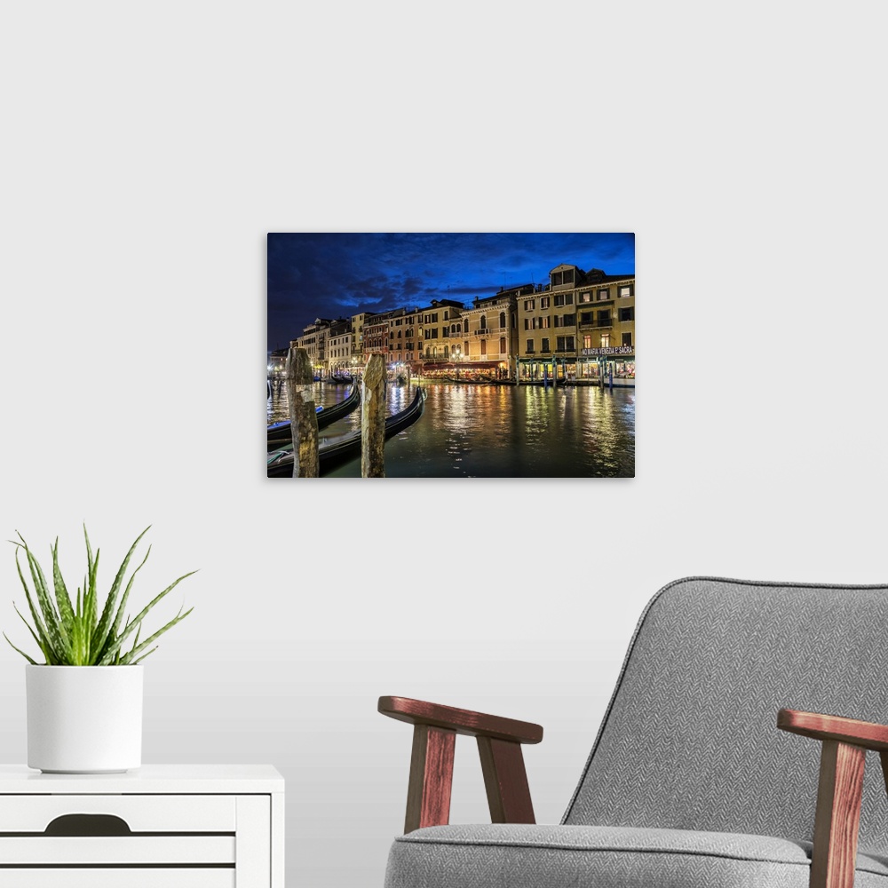 A modern room featuring Gondolas at sunset in Venice, Italy