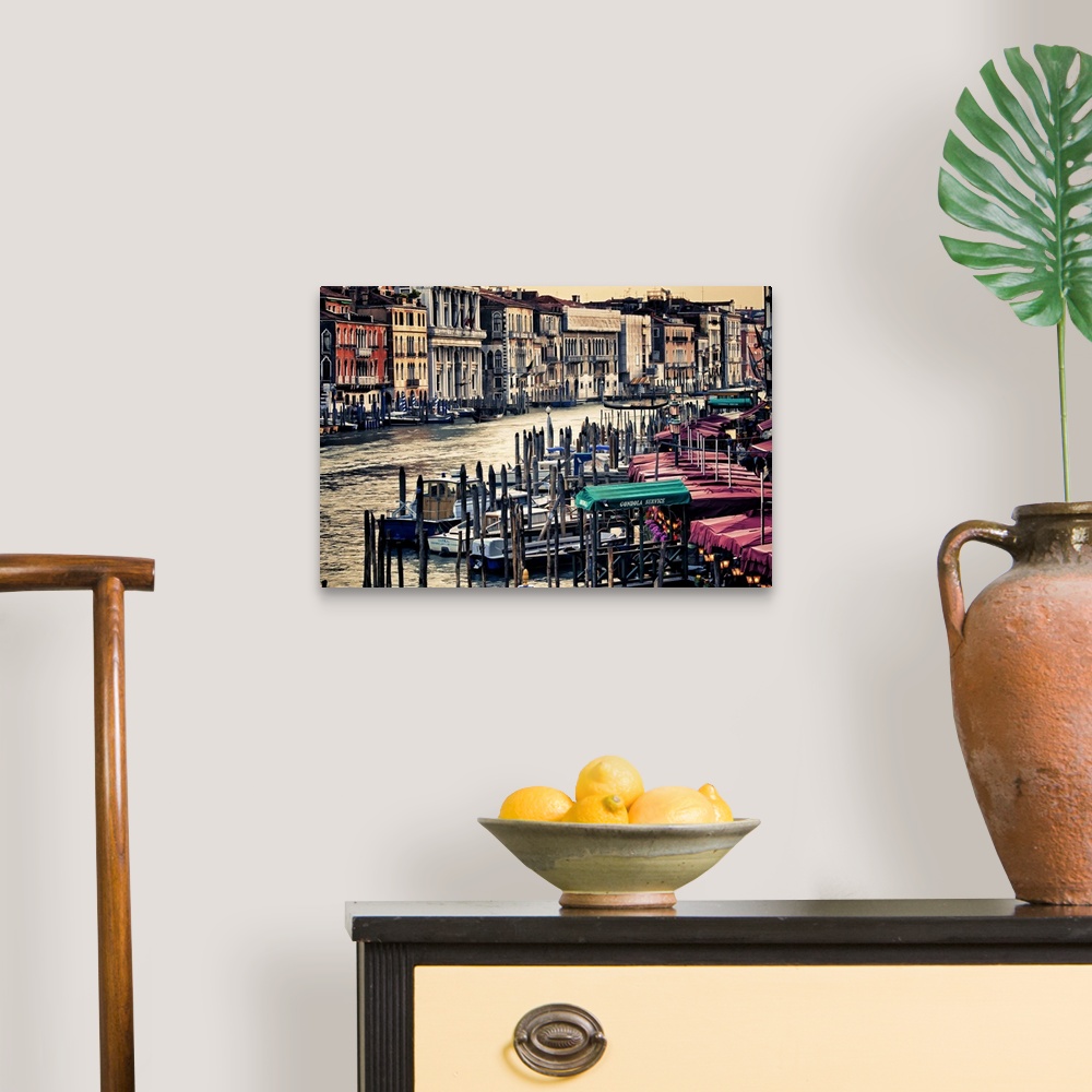 A traditional room featuring Photograph of the famous gondola boats on the river in Venice, Italy.