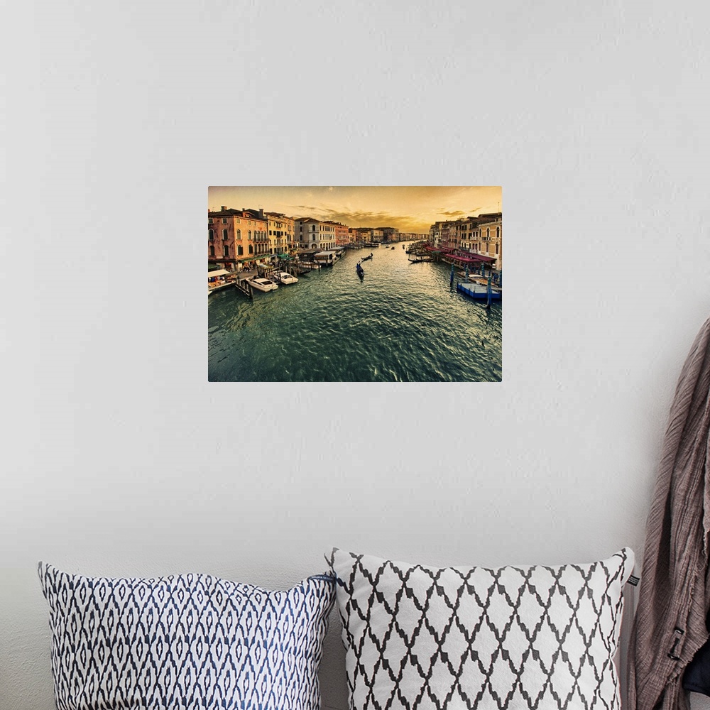 A bohemian room featuring Big canvas photo of gondolas floating down a canal with buildings lining the water on either side.