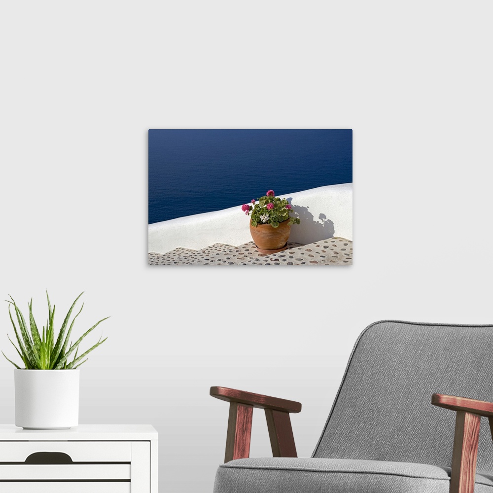 A modern room featuring Greek Flowers over the sea