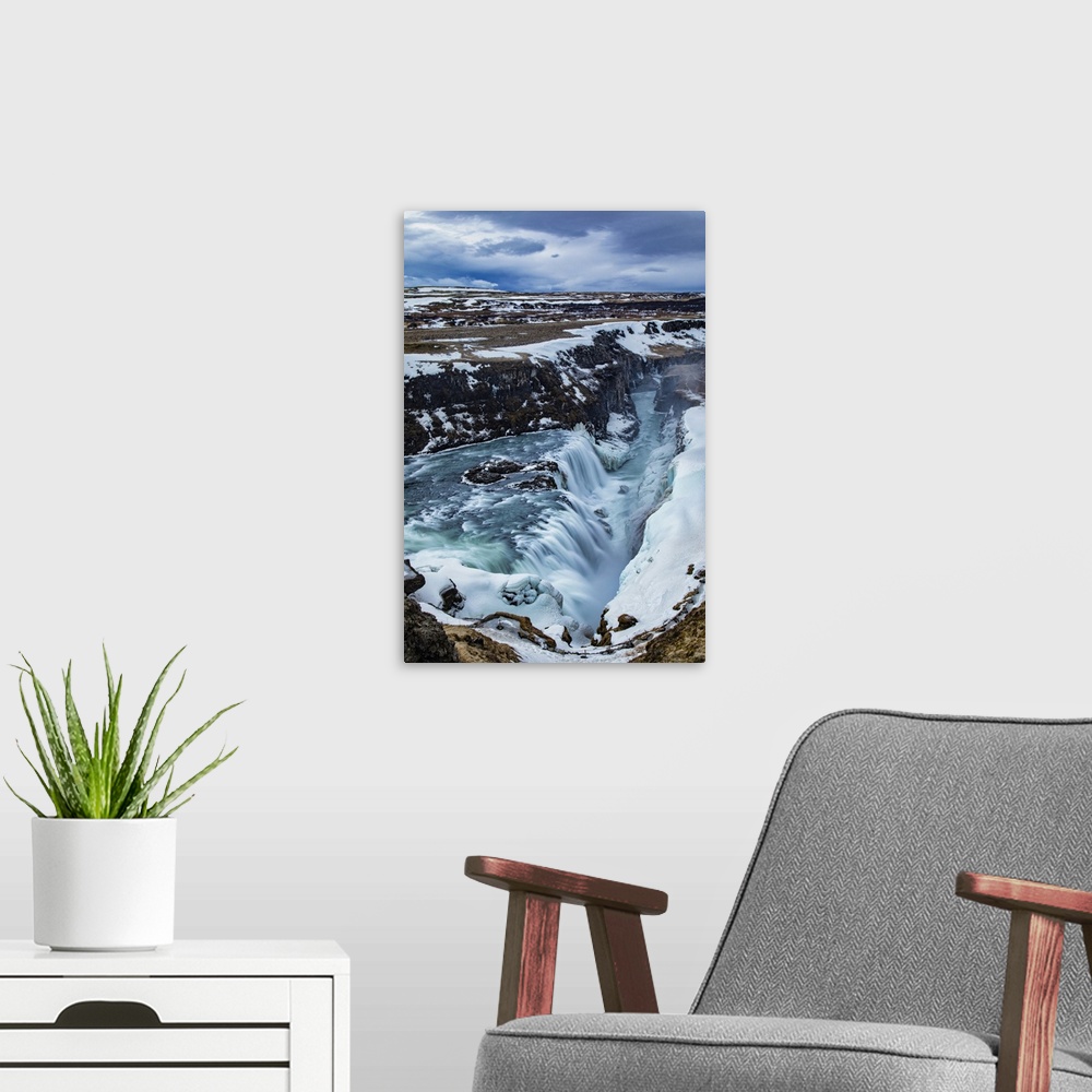 A modern room featuring Rushing water of Gullfoss Waterfall in Iceland.