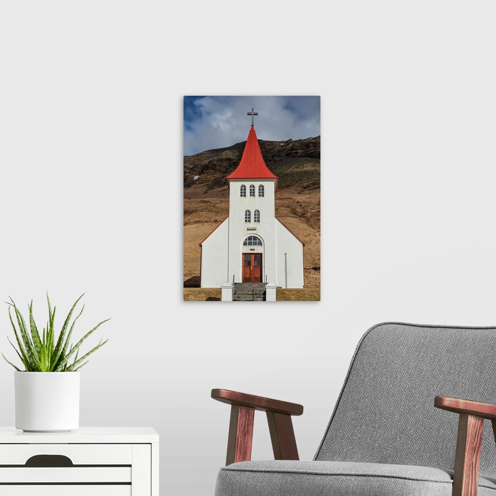 A modern room featuring Beautiful church in the countryside of Iceland.
