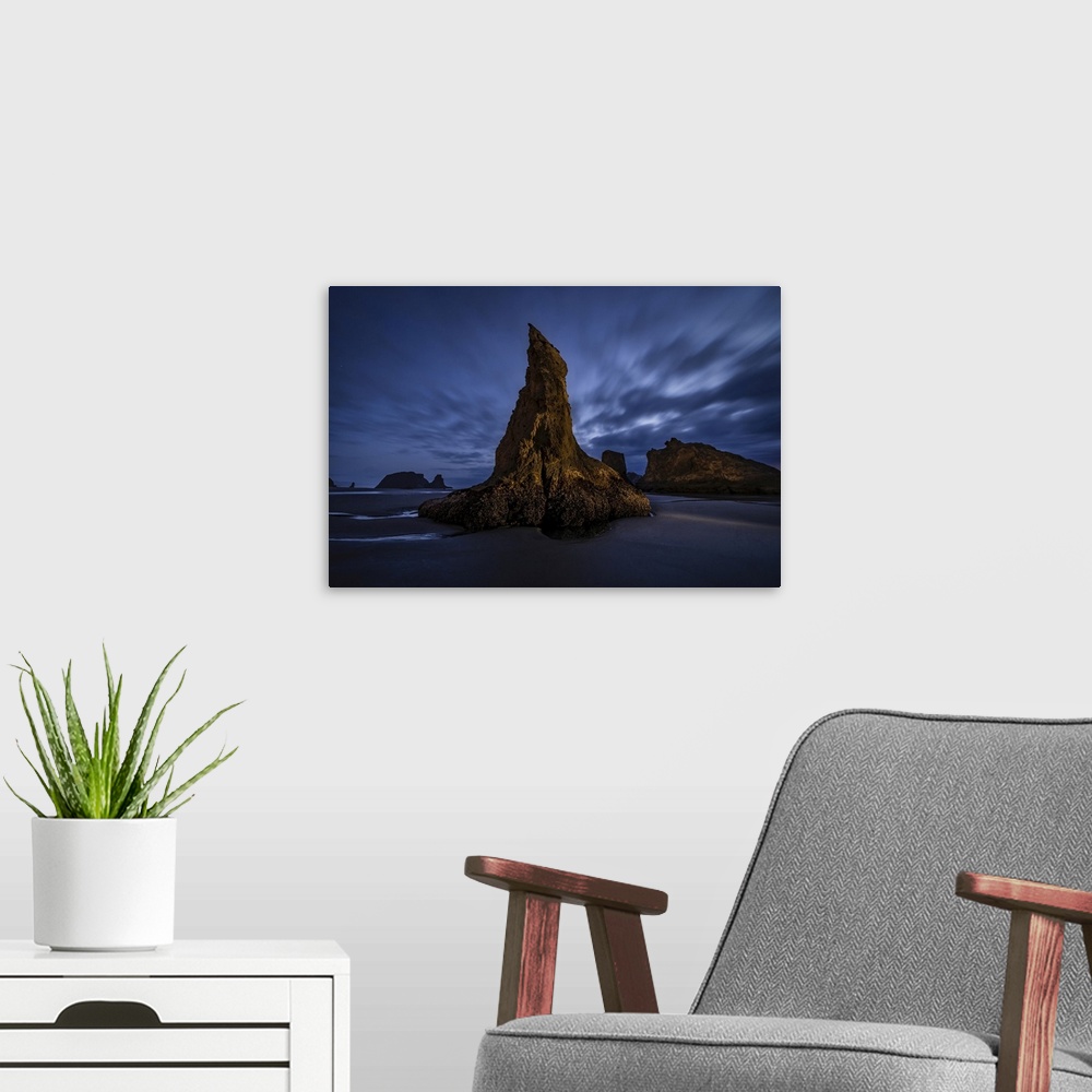 A modern room featuring Merlins Rock in Bandon on the Oregon Coast.