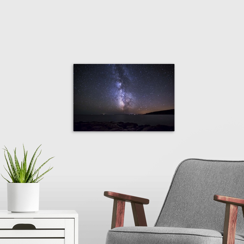 A modern room featuring Milky Way above the coast of Maine