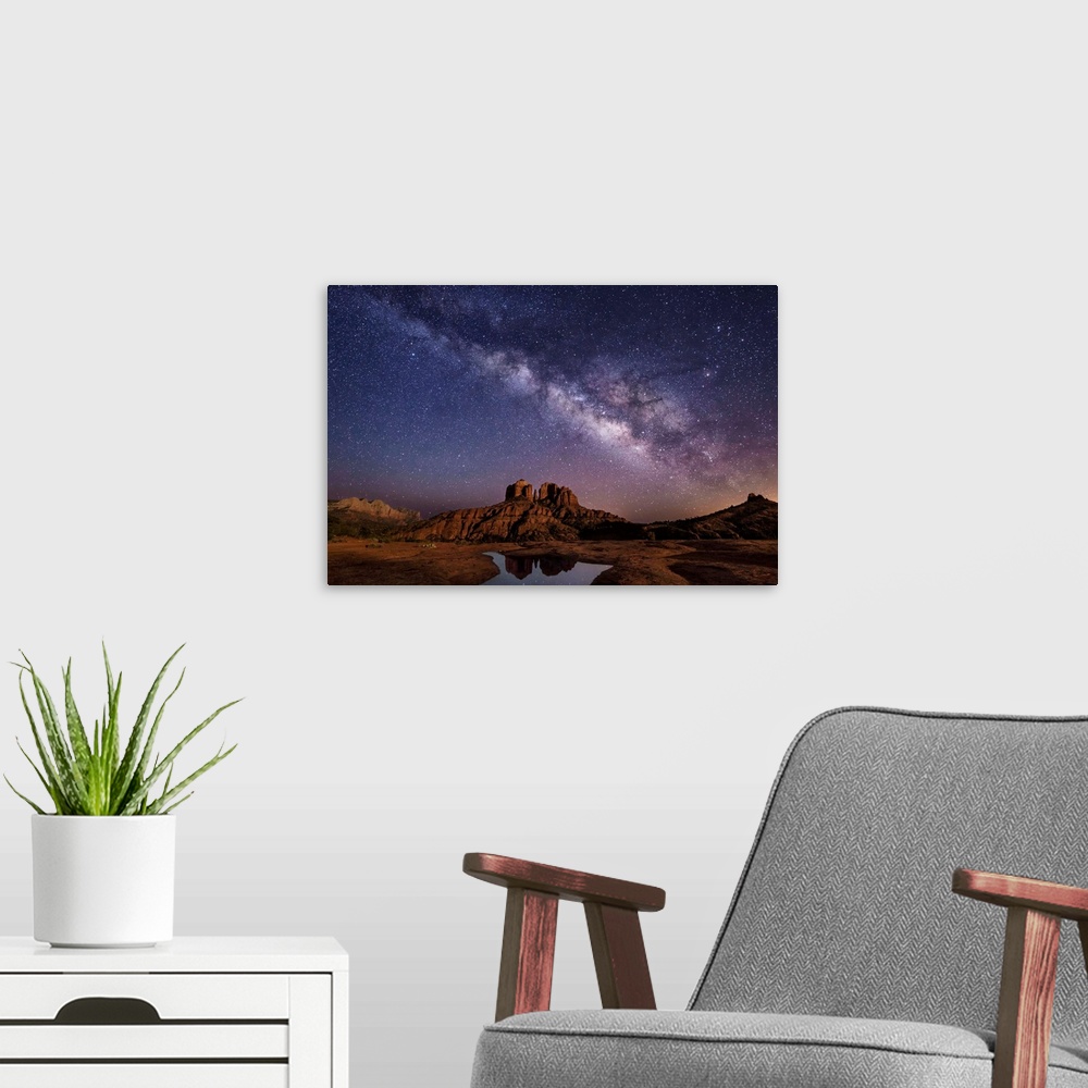 A modern room featuring Milky Way and moonlight over Cathedral Rocks in Sedona, Arizona.